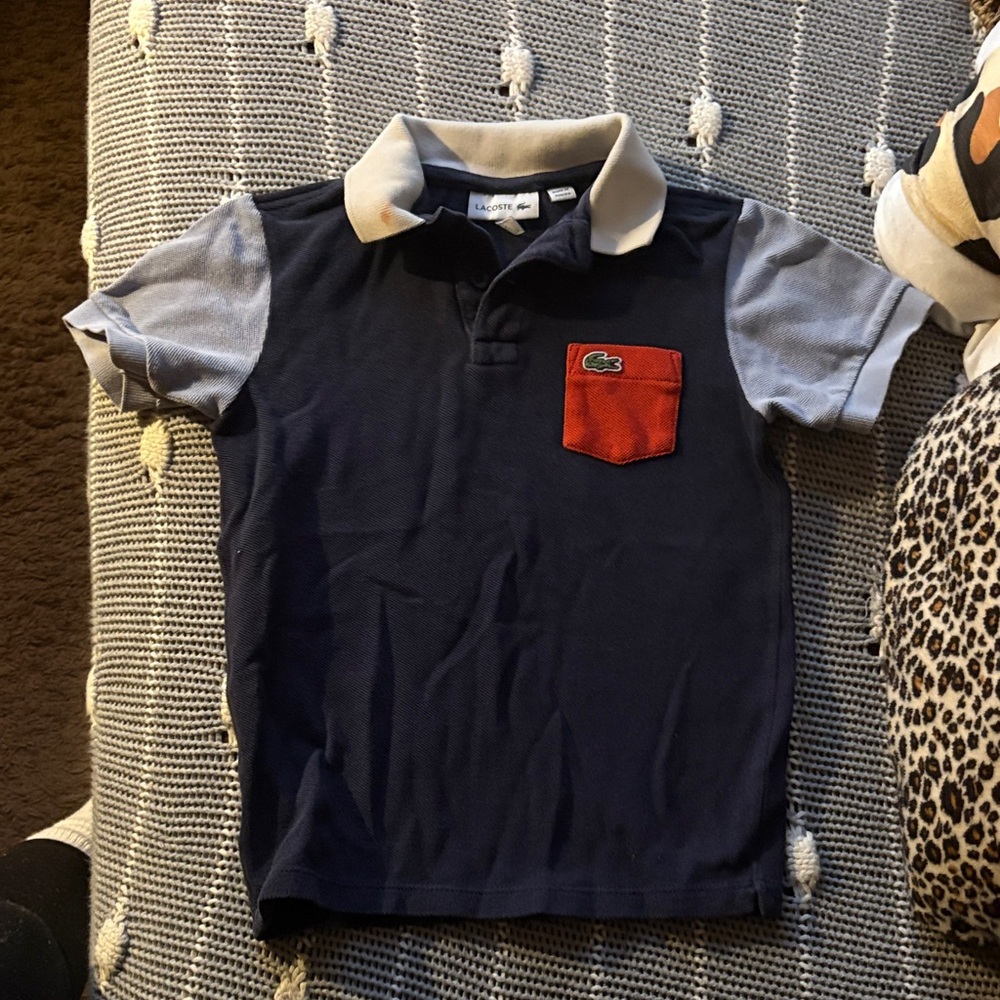 Lacoste Navy Polo with Light Gray Sleeves and Red Pocket
